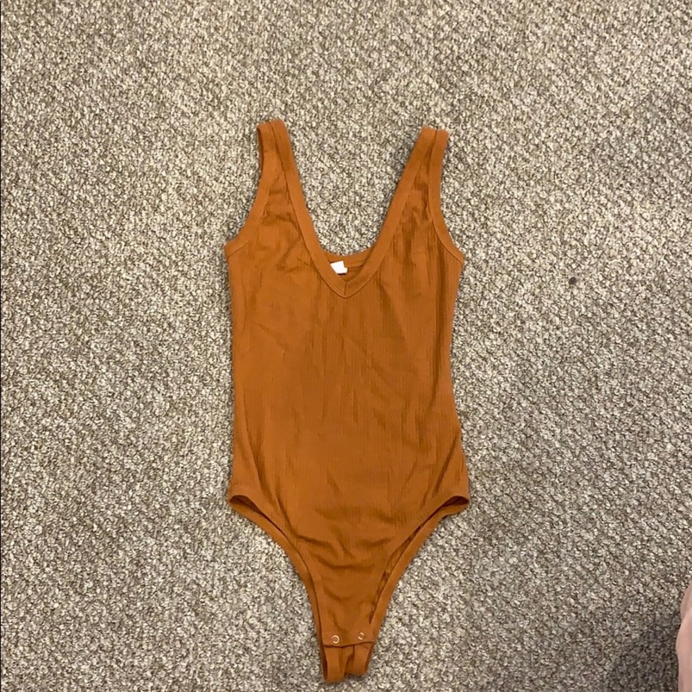 Ribbed bodysuit. Runs big